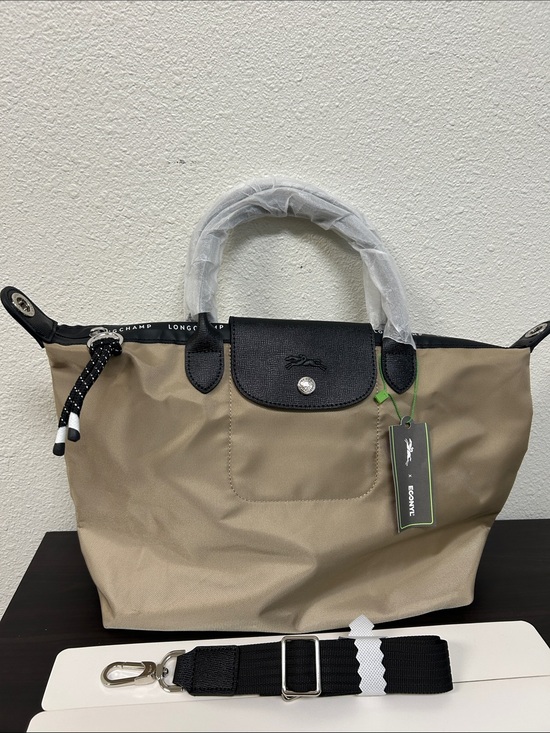 Longchamp Handbags - Longchamp Large tobacco nylon tote with black trim and strap